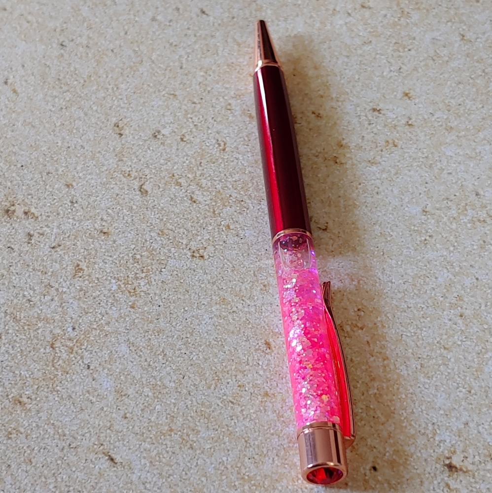 Red and pink glitter pen